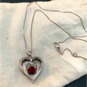 Silver double heart necklace with Ruby middle from zales